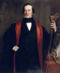 Oil painting of Richard Owen painted in 1844 by Henry William Pickersgill. In the portrait Owen holds the leg bone of a moa, and is wearing robes of Professor of Comparative Anatomy at the Royal College of Surgeons (Image: © The Trustees of the Natural History Museum, London. Used with permission)