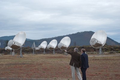 The Allen Telescope Array (ATA) built by the University of California, Berkeley and SETI (Search for Extra-terrestrial Intelligence).  This offset Gregorian design reflects incoming radio waves caught by the large parabolic dish onto the secondary parabolic reflector, which harvests the signal.  The telescope is tuned to a frequency range from 0.5 to 11.2 GHz and will eventually have 350 antennae (Image: Wikimedia Commons)